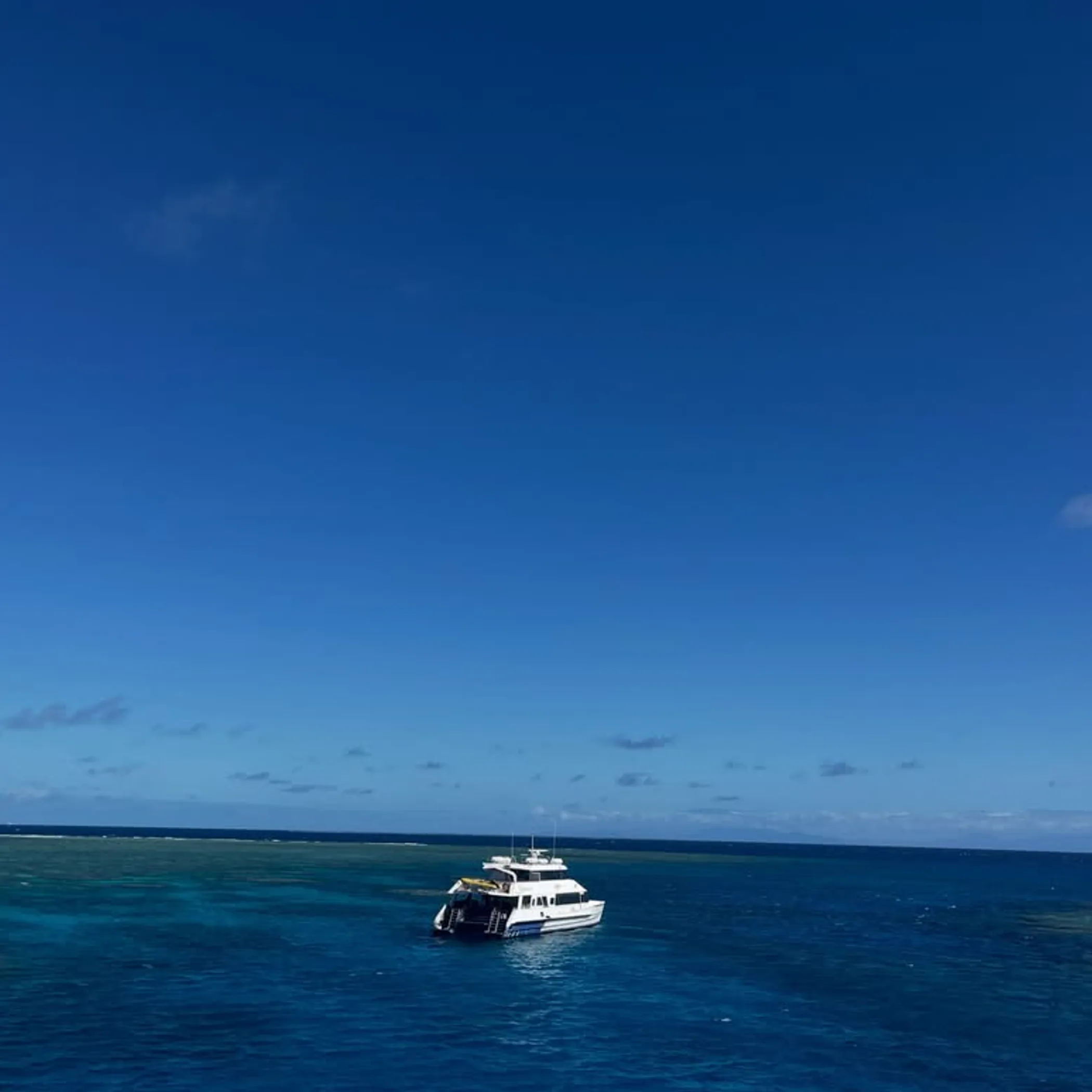 boat on tropical reef waters